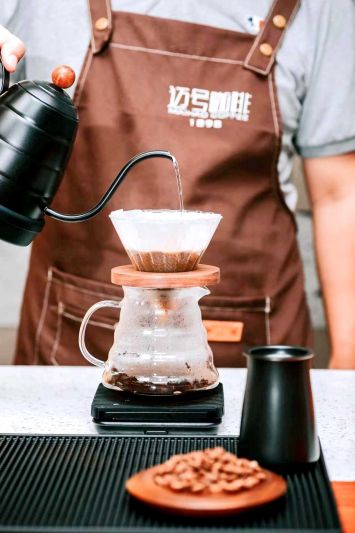 Ιστορ?α του καφ? Γουεντσ?νγκ