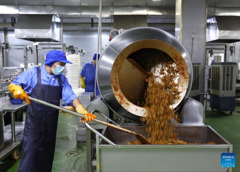 Ζυμαρικ??Luosifen, πω? απ? φαγητ? δρ?μο μετετρ?πει σε μια τερ?στια βιομηχαν?α στο Γκουανγκσ? τη? Κ?να?