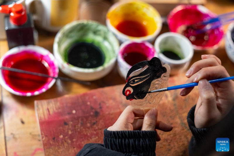 Το Θ?ατρο Σκι?ν τη? οικογ?νεια? Wang στην επαρχ?α Σιτσου?ν τη? Κ?να?